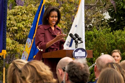 First Lady Michelle Obama marks the first anniversary of the "Joining Forces" campaign with an event including defense leaders, troops, military families and veterans at the White House, April 11, 2012. The First Lady and Dr. Jill Biden, wife of Vice President Joe Biden, launched the campaign last April to rally national support from all sectors of society to honor and support service members, veterans and their families.