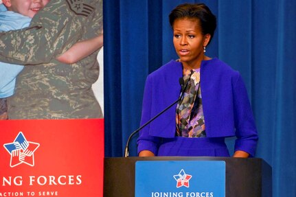 First Lady Michelle Obama announces measures to increase support for caregivers of wounded, ill and injured service members at the Labor Department in Washington, D.C., Jan. 30, 2012. These proposed rules would, in part, enable more military family members to take the time they need to care for their loved ones without fear of career repercussions.