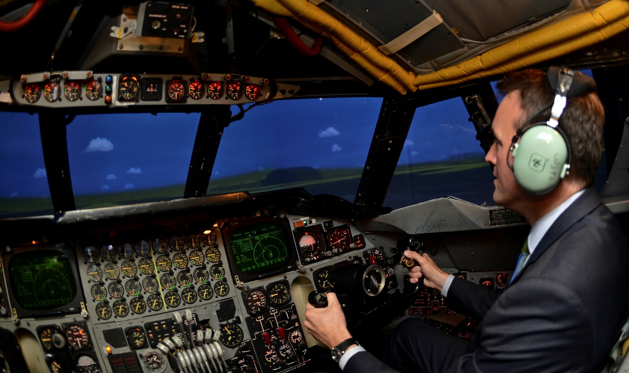Acting Secretary of the Air Force Eric Fanning flies a B-52H Stratofortress simulator Aug. 14, 2013, on Barksdale Air Force Base, La. Fanning flew the simulator and toured the facilities during his visit to the base, for an in-depth look at what it takes to fly and maintain a B-52. 