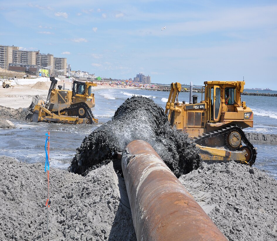 On August 15, representatives from the U.S. Army Corps of Engineers, New York District and New York City announced the beginning of sand replenishment efforts at Rockaway Beach. Crews are busy placing millions of cubic yards of sand as part of the Corps efforts to repair and restore the Rockaway coastline which was severely damaged by Hurricane Sandy.