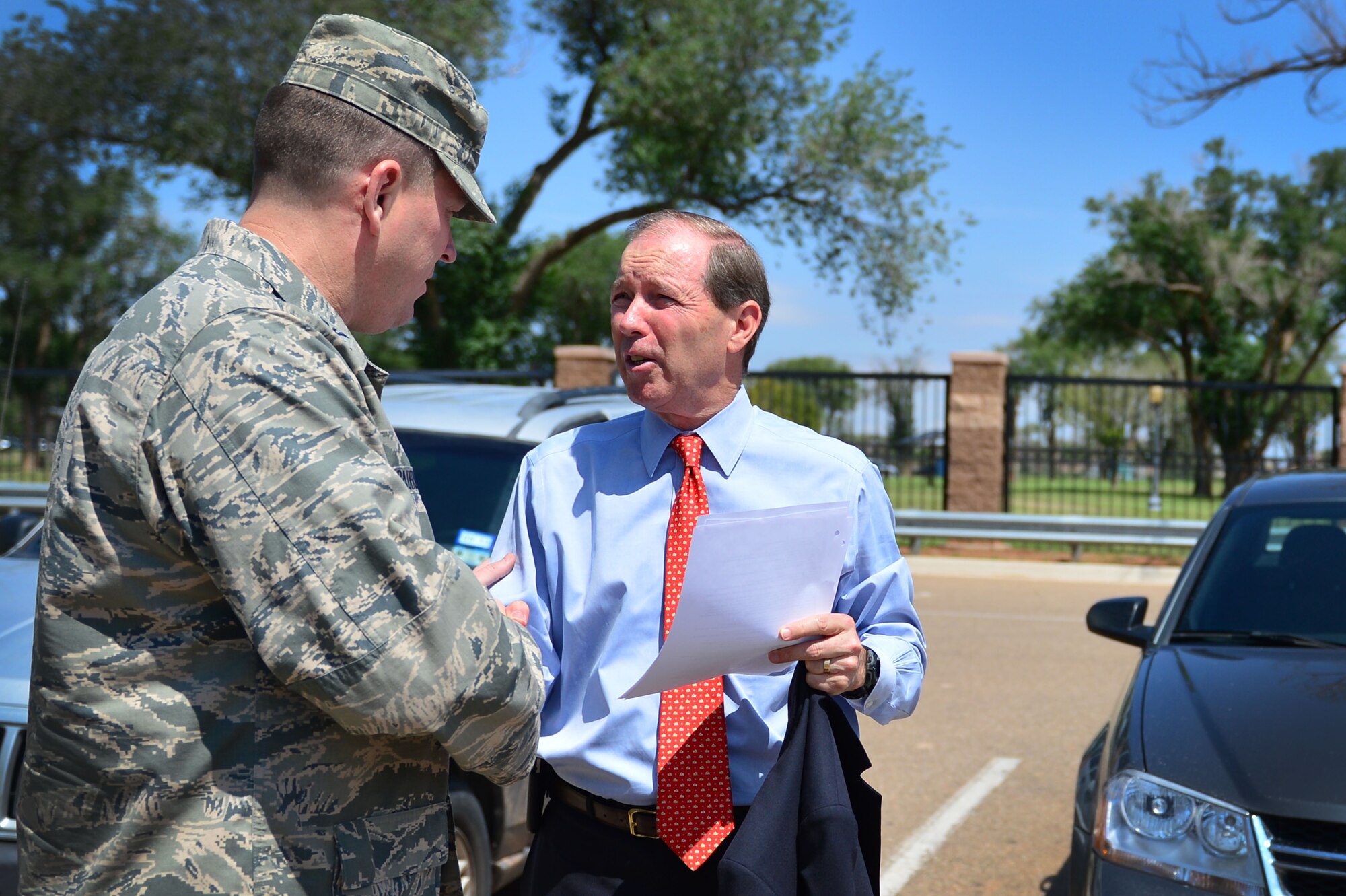 U.S. Senator Tom Udall, senior senator from New Mexico, meets Col. Tony Bauernfeind, 27th Special Operations Wing commander, Aug. 14, 2013 at Cannon Air Force Base, N.M. Udall’s visit to Cannon allowed him to gain a better understanding of current 27 SOW mission operations. (U.S. Air Force photo/ Airman 1st Class Eboni Reece)