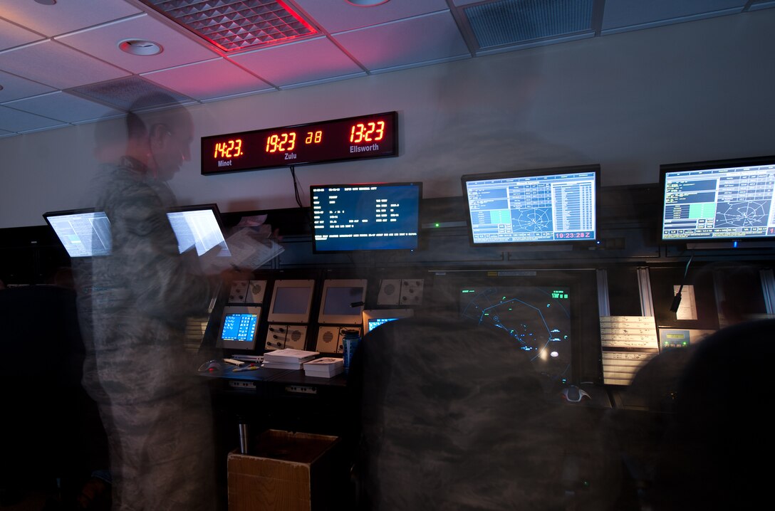 Airmen of the 28th Operations Support Squadron air traffic control radar approach center direct aircraft traffic safely at Ellsworth Air Force Base, S.D., Aug. 13, 2013. The Ellsworth AFB air traffic control radar approach facility is the only facility in the Air Force with a consolidated airspace. (U.S. Air Force photo by Airman 1st Class Alystria Maurer/Released)