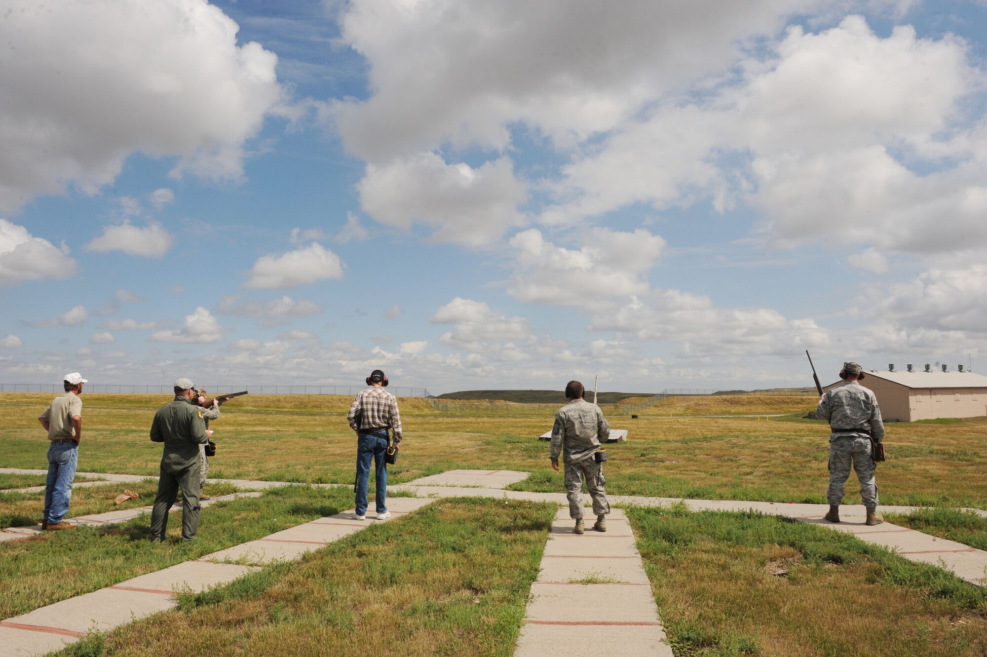 Airmen gather to compete in the Command Chief Challenge hosted by the 28th Force Support Squadron at the Trap and Skeet Range on Ellsworth Air Force Base, S.D. Aug. 9, 2013. The challenge provided an opportunity for Airmen to participate in one of the many activities the base has to offer. (U.S. Air Force photo by Airman 1st Class Rebecca Imwalle/Released)