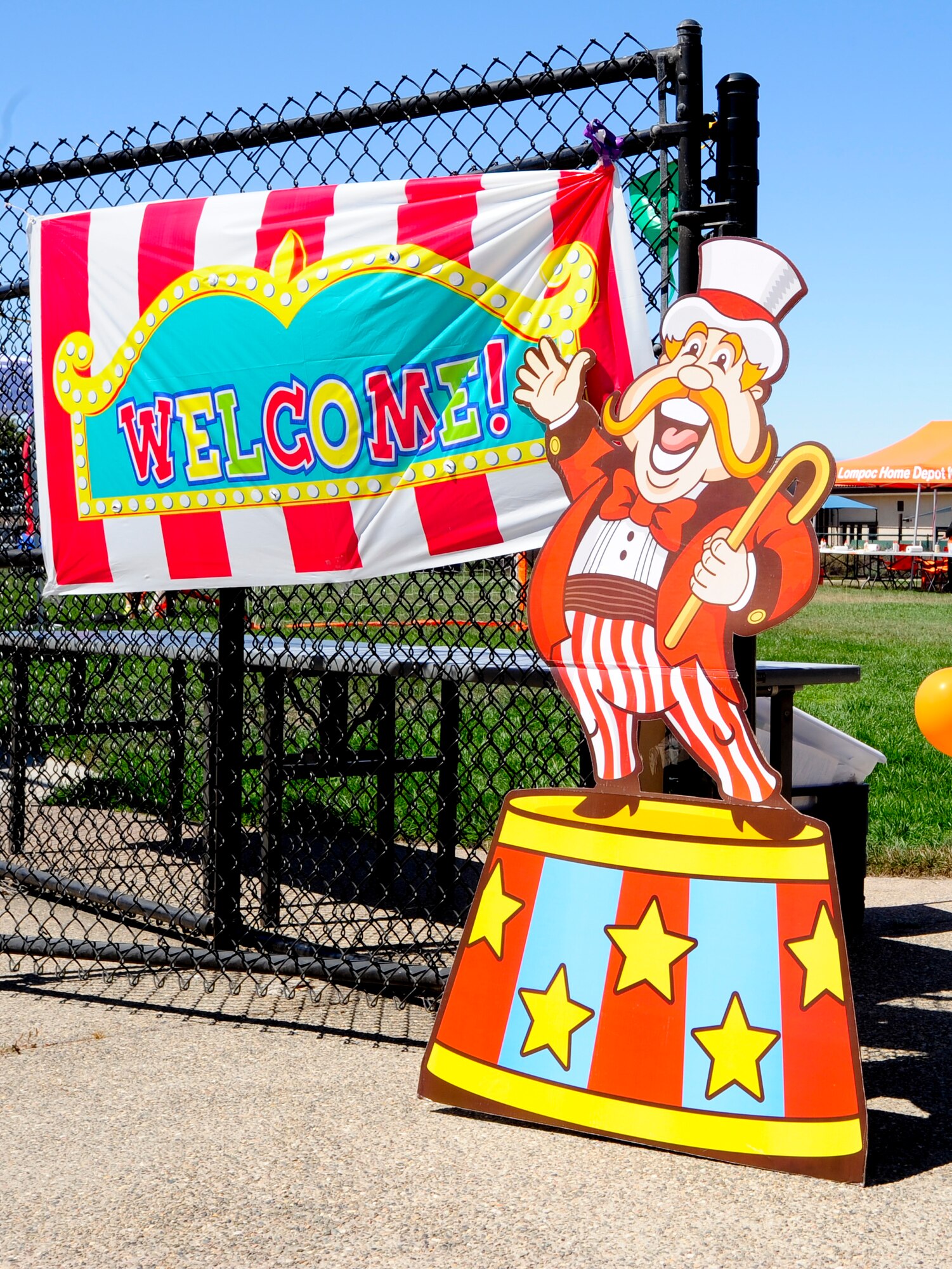 VANDENBERG AIR FORCE BASE, Calif. – A circus themed welcome sign is set up for the 4th annual Salute to Youth event here Thursday, August 15, 2013. Salute to Youth was both an educational and family friendly event. It hosted the Exceptional Family Member Program, local schools, Backpack Brigade, food, games and prizes. (U.S. Air Force photo/Airman Yvonne Morales)