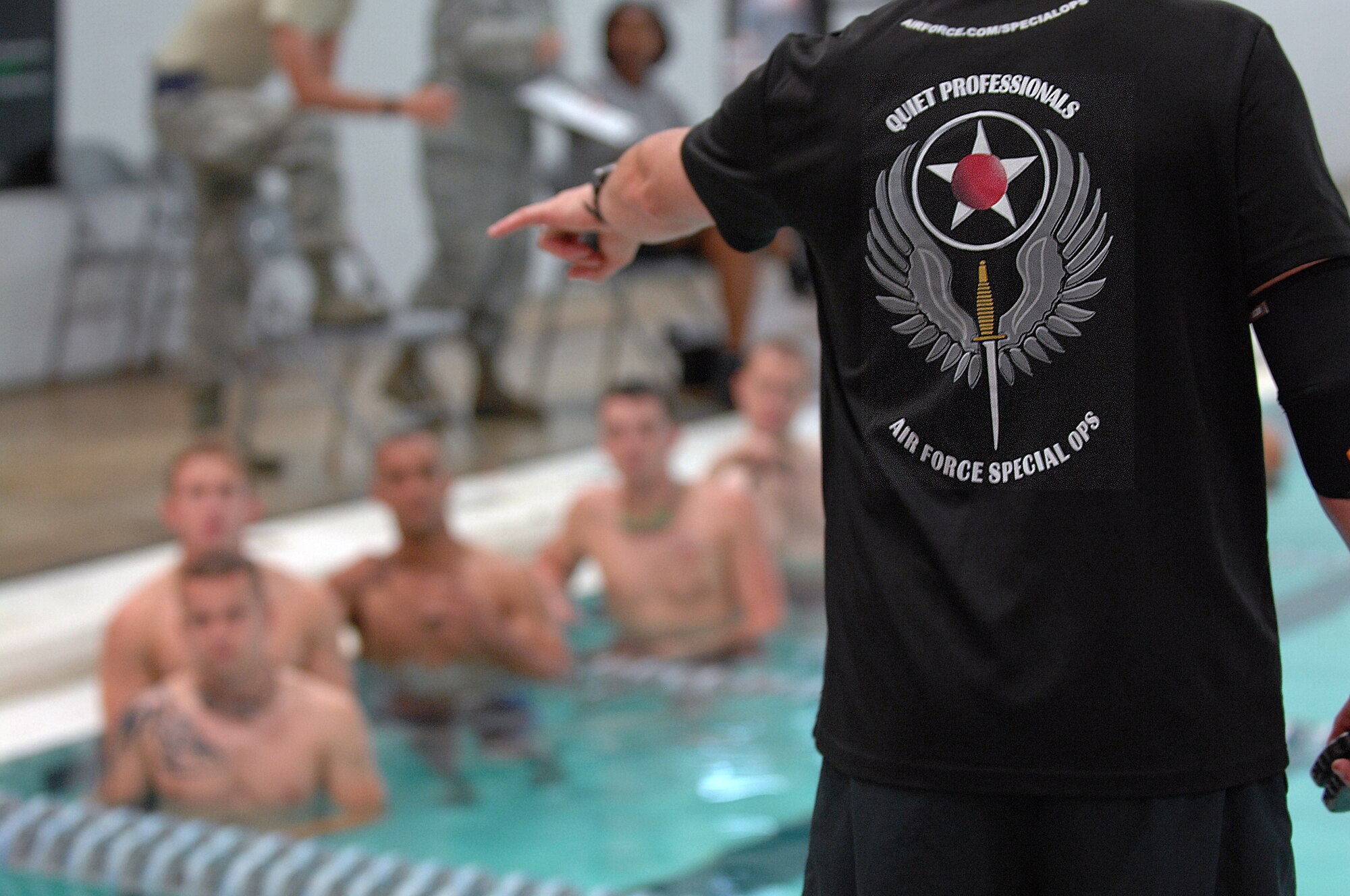 U.S. Air Force Airmen assigned to Seymour Johnson Air Force Base prepare for the swimming portion of a Physical Ability and Stamina Test (PAST) in Goldsboro, N.C., Aug. 12, 2013.  The PAST is required for Airmen looking to transition into a special tactics career field, to include: Pararescue, Combat Controller, Special Operations Weather Technician, Tactical Air Control Party and Survivial, Evasion, Resistance and Escape specialist.  (U.S. Air Force photo by Airman 1st Class Brittain Crolley/Released)