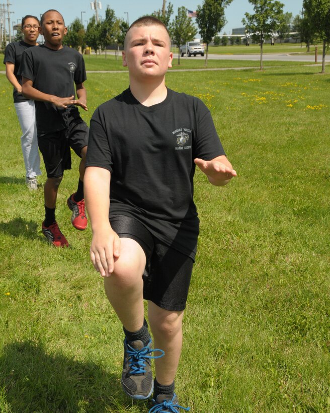 Members of the Niagara Youth Marine Cadets participate in Plyometrics, a series of cardio, strength and conditioning exercises at the Niagara Falls Air Reserve Station on August 15, 2013. The group visited the Air Reserve Station recently which included s security forces, fire fighting, and explosive ordinance disposal demonstration. (U.S. Air Force photo by Peter Borys)