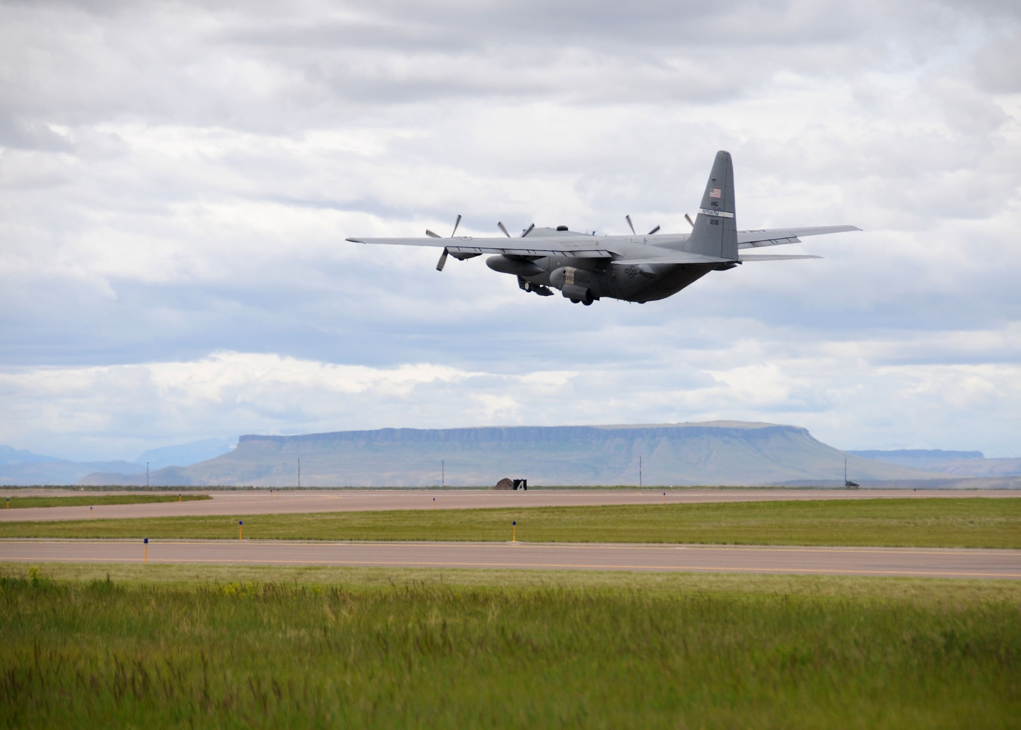 A C-130 Hercules assigned to the Kentucky Air National Guard takes off from the runway at the Great Falls International Airport on June 1, 2012. (U.S. Air Force photo/Senior Master Sgt. Eric Peterson)  