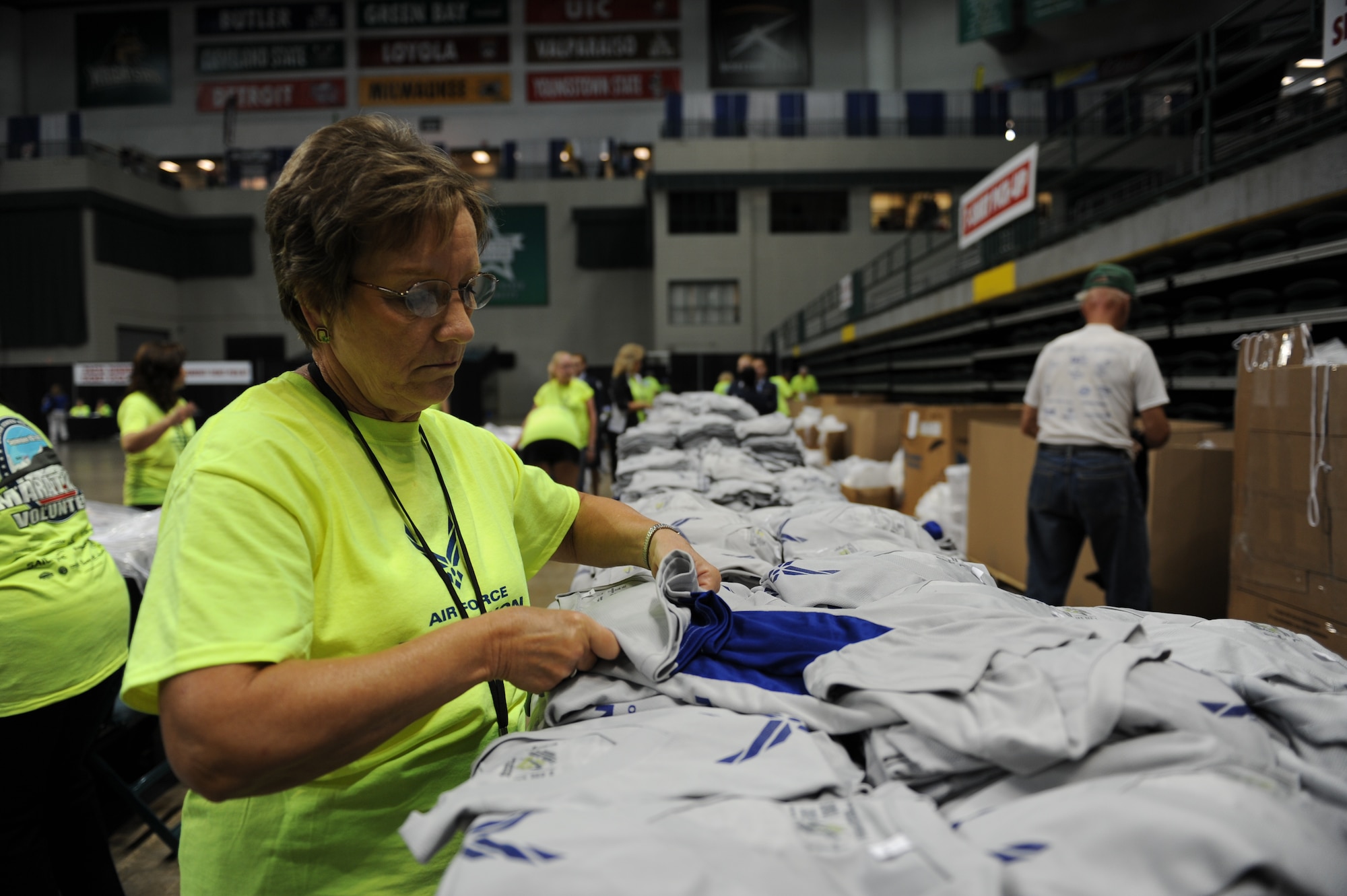 Volunteers help out at the annual Air Force Marathon in many ways, such as assisting at the Sports & Fitness Expo the two days prior to the race. Volunteers can help with runner bib pick-up, shirt distribution, security, merchandise sales and more. 