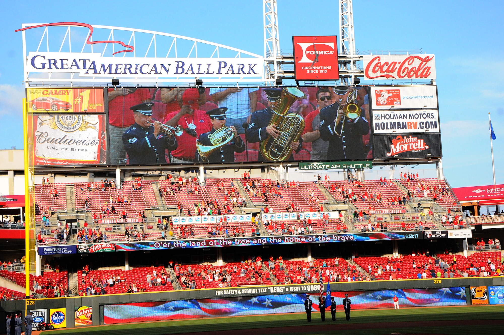 The Wright Brass performs the national anthem as the Wright-Patterson Air Force Base Honor Guard presents the colors Aug. 9 at Great American Ball Park.  (photo by Niki Jahns)