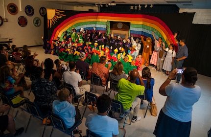 Children from the Joint Base Charleston – Weapons Station Youth Programs Center, pose for a photo after participating in the play “The Wizard of Oz” August 2, 2013 put on by Missoula Children's Theatre and the Youth Programs Center at JB Charleston- WS, S.C. The Missoula Children's Theatre International Tour has fostered development life skills in more than a million children. This year alone, the Missoula Children Theatre will work with 65,000 children in more than 1,200 communities in all 50 states and 17 countries. (U.S. Air Force photo/Senior Airman Ashlee Galloway)