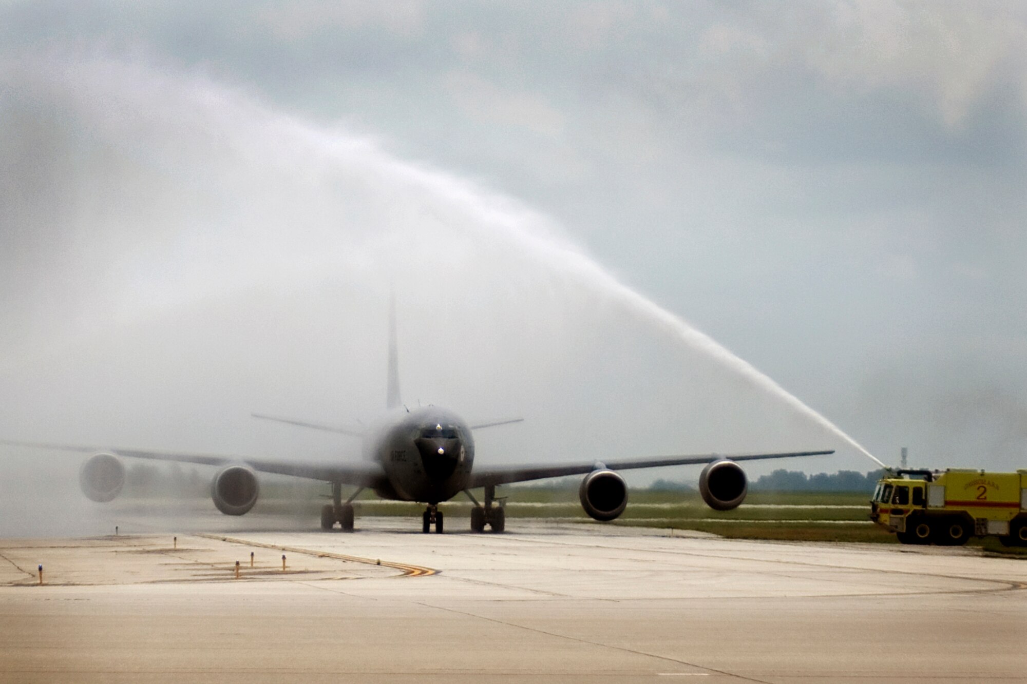 The Grissom Fire Department showers a KC-135R Stratotanker as Col. Chris Amend, 434th Operations Group commander taxis in from his final flight Grissom Air Reserve Base, Ind., Aug. 7, 2013. Amend is headed to Scott AFB, Ill., where he will serve as the reserve advisor to the commander of Air Mobility Command. (U.S. Air Force photo/Tech. Sgt. Mark R.W. Orders-Woempner)