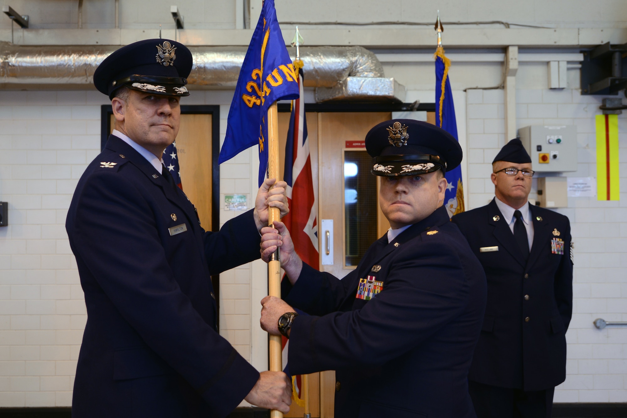 RAF WELFORD, United Kingdom - Maj. Jeremy Wells assumed command of the 420th Munitions Squadron from Col. Charles Hamilton, 422nd Air Base Group commander, in a change of command ceremony at the RAF Welford Fire Department Aug. 6. (U.S. Air Force photo by Tech. Sgt. Chrissy Best)
