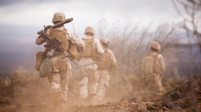 Lance Cpl. Jessica Romero, an Athens, TX native and combat engineer with Engineer Service Company, Combat Logistics Battalion 3, carries a M028 Bangalore torpedo to a breaching position during a live-fire attack at the Infantry Platoon Battle Course, Range 10 in Pohakuloa Training Area, Hawaii, July 20. The combat engineers were attached to 2nd platoon, Golf Company, 2nd Battalion, 3rd Marine Regiment to breach obstacles obstructing the Marines advance through the attack as part of Exercise Lava Viper. Lava Viper is a battalion-level combined-arms exercise designed to enhance the skills of the ground combat and support element Marines participating. (U.S. Marine Corps photo by Cpl. Matthew Callahan/Released)