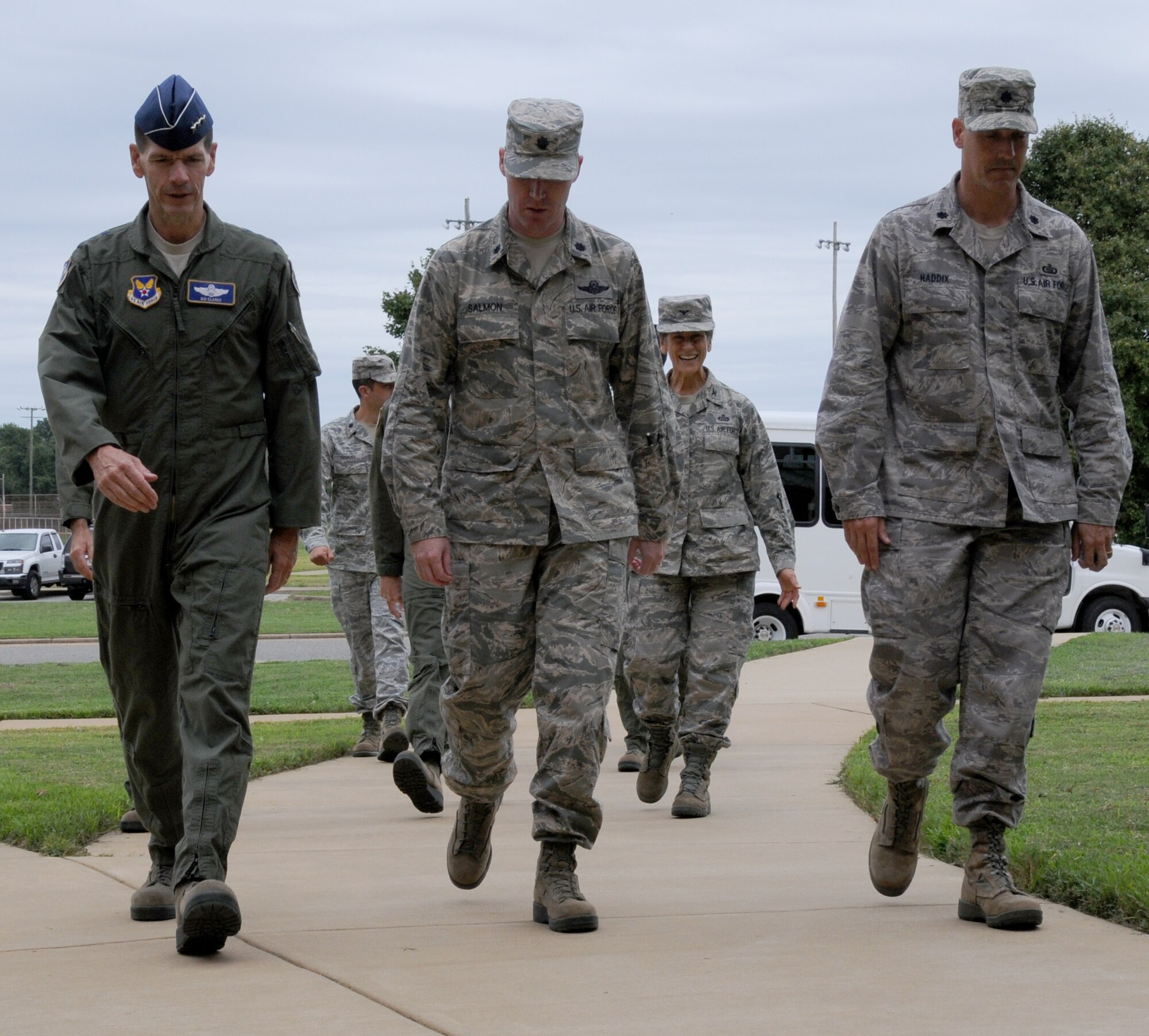 Lt. Gen. Stanley E. Clarke III (left), director of the Air National Guard walks toward the Distributed Ground Station building with 192d Fighter Wing and 497th intelligence personnel during a visit to Joint Base Langley-Eustis, Va., Aug. 16. The visit is Clarke's first to the Virginia Air Guard since becoming director. During the visit, Clarke met with Airmen from the low observables section and the intelligence squadron where he listened to Airmen talk about the Total Force Integration with the 1st FW. (U.S. Air National Guard photo by Master Sgt. Carlos Claudio/Released).