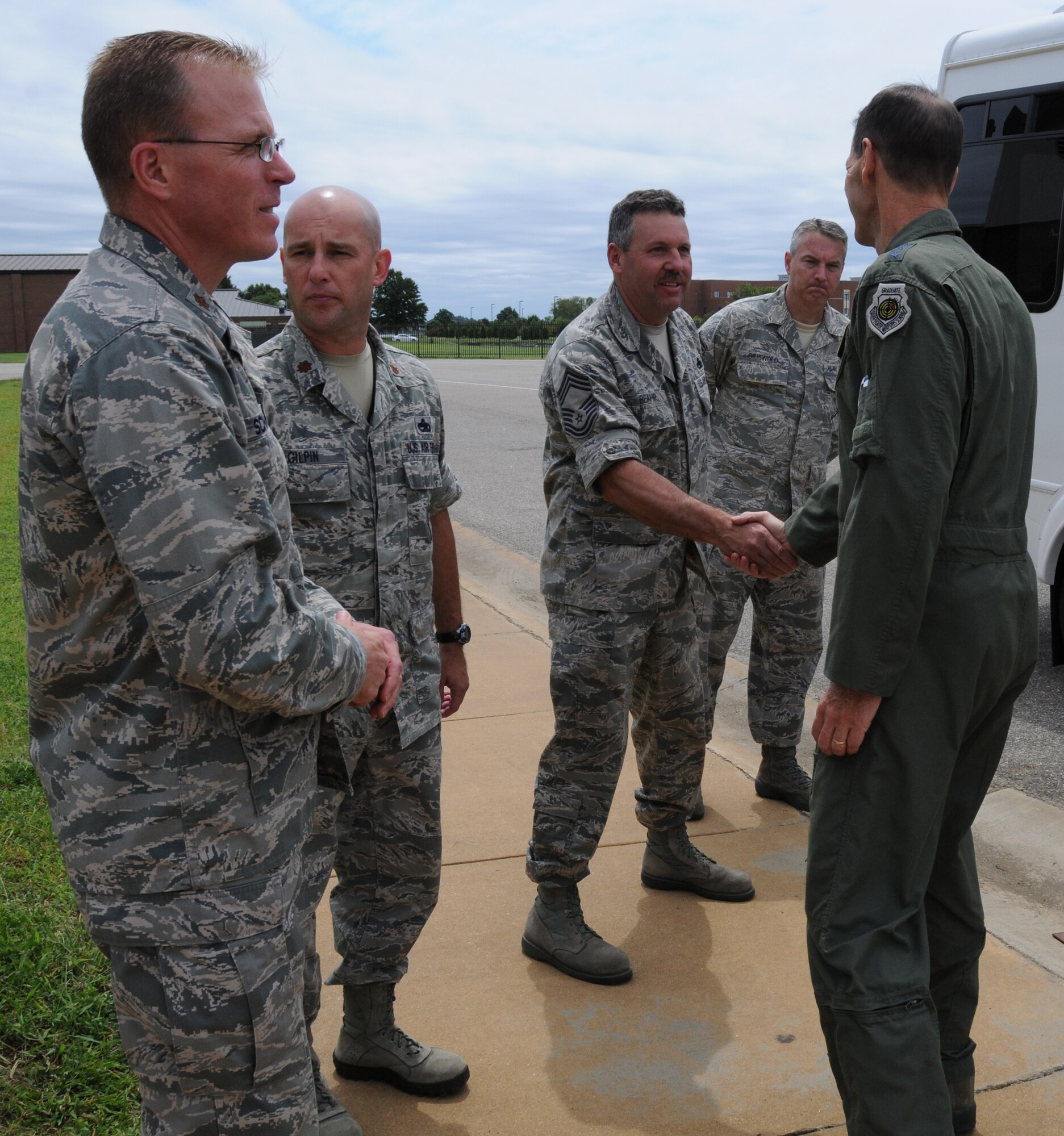 Lt. Gen. Stanley E. Clarke III (right), director of the Air National Guard, meets with Chief David L. Beahr, 192d Aircraft Maintenance Squadron at Joint Base Langley-Eustis Hampton, Va., Aug 16. Gen. Clarke met with Airmen from the 192d Fighter Wing, Virginia Air National Guard while visiting JBLE.  (U.S. Air National Guard photo by MSgt. Carlos Claudio).