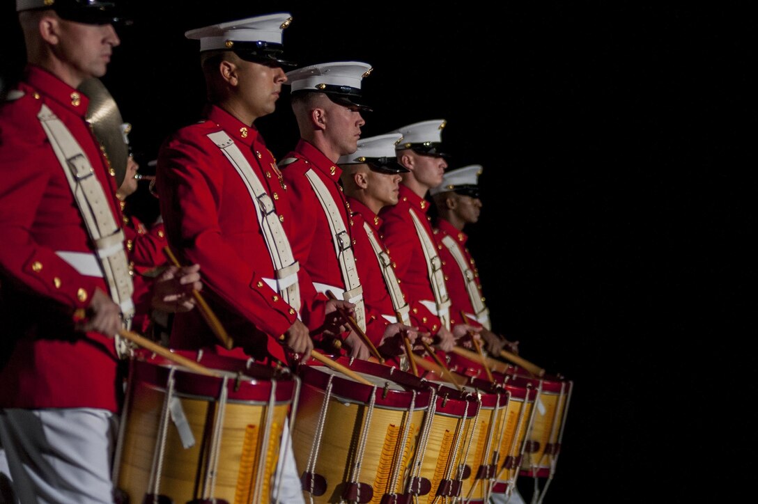 The U.S. Marine Drum & Bugle Corps peforms during a Friday Evening Parade at Marine Barracks Washingont, D.C., Aug. 16.