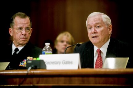 Defense Secretary Robert M. Gates testifies before the Senate Appropriations Committee with Navy Adm. Mike Mullen, chairman of the Joint Chiefs of Staff, looking on in the Dirksen Senate Office Building, in Washington, D.C., June 16, 2010.