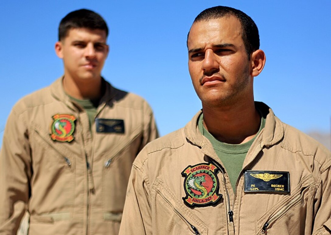 Lance Cpl. Patrick Becker and Sgt. Michael Losey, both crew chiefs with Marine Light Attack Helicopter Squadron 367, met at Naval Air Station, Pensacola, Fla., and later became brother-in-laws when Becker met Losey’s sister. 