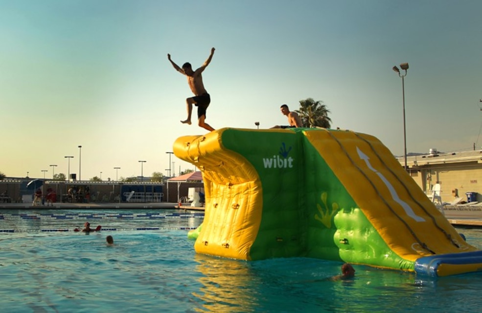 Marines with Headquarters Battalion attended a battalion pool party at the Combat Center’s Training Tank Aug. 8, 2013. The event featured free food and pool-side fun as well as a raffle.