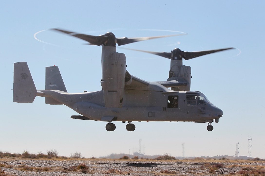 CLEVELAND NATIONAL FOREST, Calif.- A MV-22B Osprey tilt-rotor aircraft, from Marine Aircraft Group 16, from Marine Corps Air Station Miramar, touches down at a remote landing zone.  Marine Wing Support Squadron 374, from Marine Corps Air Ground Combat Center Twentynine Palms, Calif., during a field exercise to maintain remote helicopter landing zones. They sprayed the surface with a dust control compound in advance of arrival of Col. Patrick Gramuglia, commanding officer of MAG 16, to evaluate effectiveness of the product.  (U.S. Navy photo by Greg Vojtko)