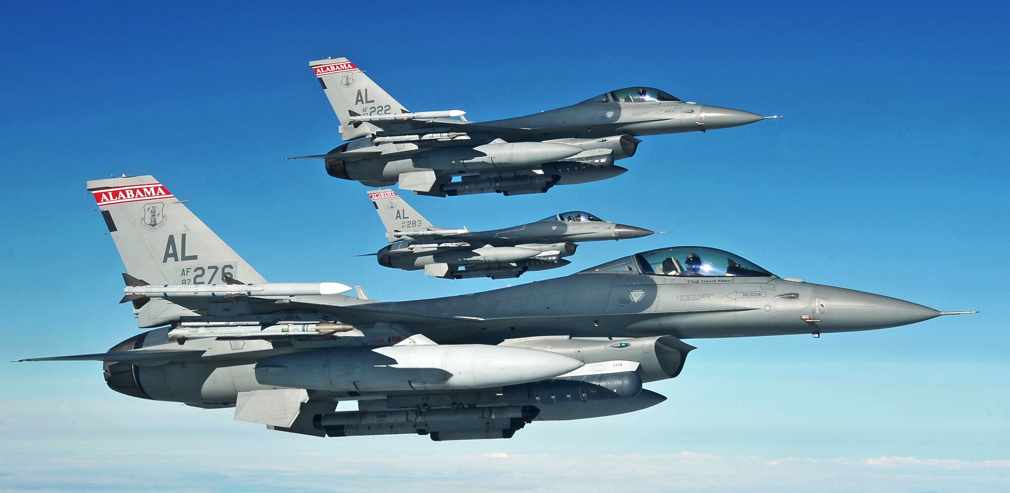 A formation of F-16 Fighting Falcons assigned to the 100th Fighter Squadron, Dannelly Field, Ala., waits to refuel over the Joint Pacific Alaska Range Complex during RED FLAG-Alaska 13-3 Aug. 19, 2013, Eielson Air Force Base Alaska.  The JPARC airspace covers more than 67,000 square miles and is the largest military air-ground training complex in North America. (U.S. Air Force photo by Staff Sgt. Miguel Lara III/Released)