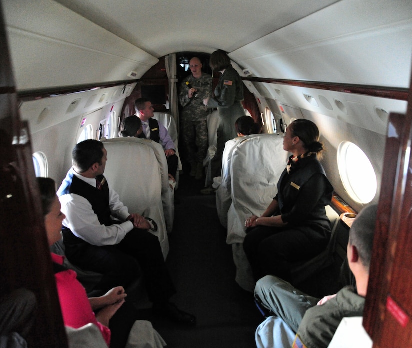 Army flight stewards brief their mission aboard an army aircraft during a joint service culinary training session on Joint Base Andrews, Md., Aug. 14, 2013. Army flight stewards and Air Force flight attendants conducted a training class to obtain and develop new skills from one another. (U.S. Air Force photo/Airman 1st Class Erin O’Shea)