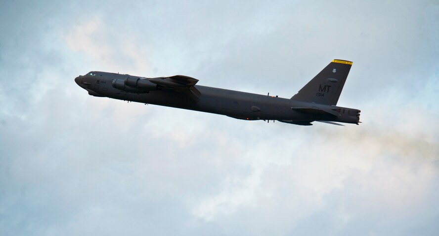 A B-52H Stratofortess flies off during a minimum-interval takeoff at Minot Air Force Base, N.D., Aug. 15, 2013. In a conventional conflict, the B-52 can perform strategic attack, close-air support, air interdiction, offensive counter-air and maritime operations. (U.S. Air Force photo/Senior Airman Brittany Y. Auld)