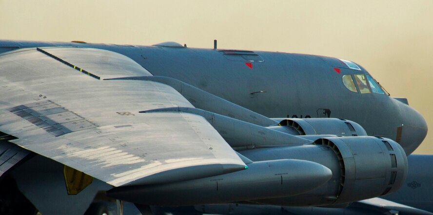 A B-52H Stratofortess taxi’s to the runway during a minimum-interval takeoff at Minot Air Force Base, N.D., Aug. 15, 2013. A MITO take-off uses starter cartridges filled with gun powder to quickly fire up the B-52 engines. (U.S. Air Force photo/Senior Airman Brittany Y. Auld)