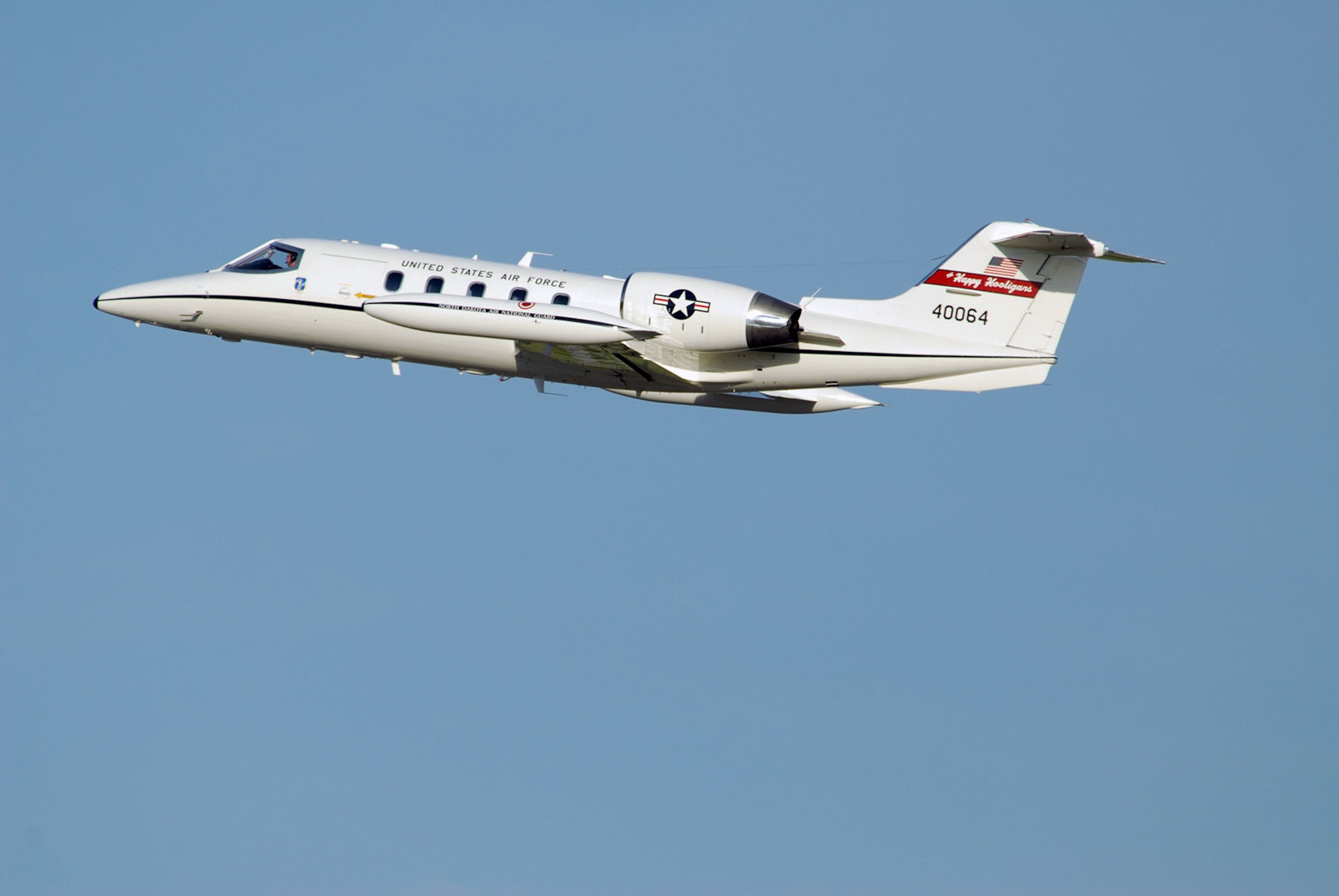 Lt. Col. Rick Omang and 1st Lt. Gregory Ames, both of the 177th Airlift Squadron, pilot a C-21 aircraft as they launch from Hector International Airport, Fargo, N.D., in 2009. This was the first time the North Dakota Air National Guard C-21s deployed to Southwest Asia in support of Operation Enduring Freedom. (DoD photo by Senior Master Sgt. David H. Lipp, 119th Wing)