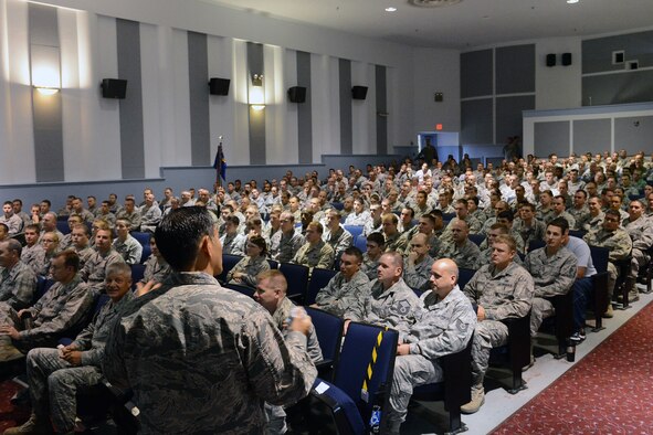Col. David Kumashiro, 62nd Airlift Wing commander, speaks to Airmen of the 62nd AW about joint basing and creating a culture of dignity and respect at his commander’s call, Aug. 19, 2013, at the McChord Theater at Joint Base Lewis-McChord, Wash. After addressing key issues with the Airmen, Kumashiro opened the floor to questions from the Airmen. (U.S. Air Force Photo/Airman 1st Class Jacob Jimenez) 

