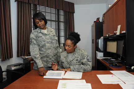 Master Sgt. Terri Harmon and Master Sgt. Sanelle Romero, former and current Joint Base San Antonio-Randolph career assistance advisors, respectively, discuss roles and responsibilities of the position Aug. 2.  ( U. S. Air Force photo by Don Lindsey)