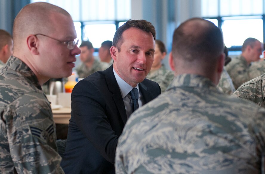 Acting Secretary of the Air Force Eric Fanning, visits with Senior Airmen David Chupak, 90th Missile Maintenance Squadron, and Christopher Baskerville, 790th Missile Security Forces Squadron, during breakfast with Airman Leadership School students on F.E. Warren Air Force Base, Wyo., Aug. 16, 2013. (U.S. Air Force photo by R.J. Oriez)