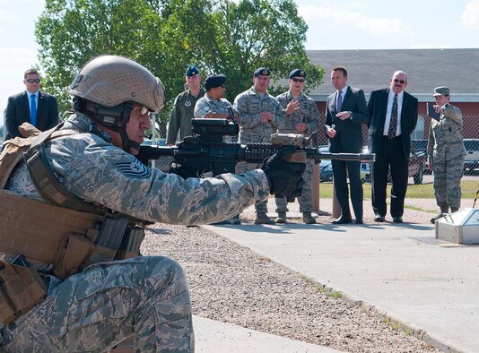Acting Secretary of the Air Force Eric Fanning, third from right, watches Tech. Sgt. Bobby DeLeon, and other members of the 90th Security Group Tactical Response Force, demonstrate the team’s capability during a visit to the 90th Missile Wing’s training launch facility on F.E. Warren Air Force Base, Wyo., Aug. 15, 2013. (U.S. Air Force photo by R.J. Oriez)