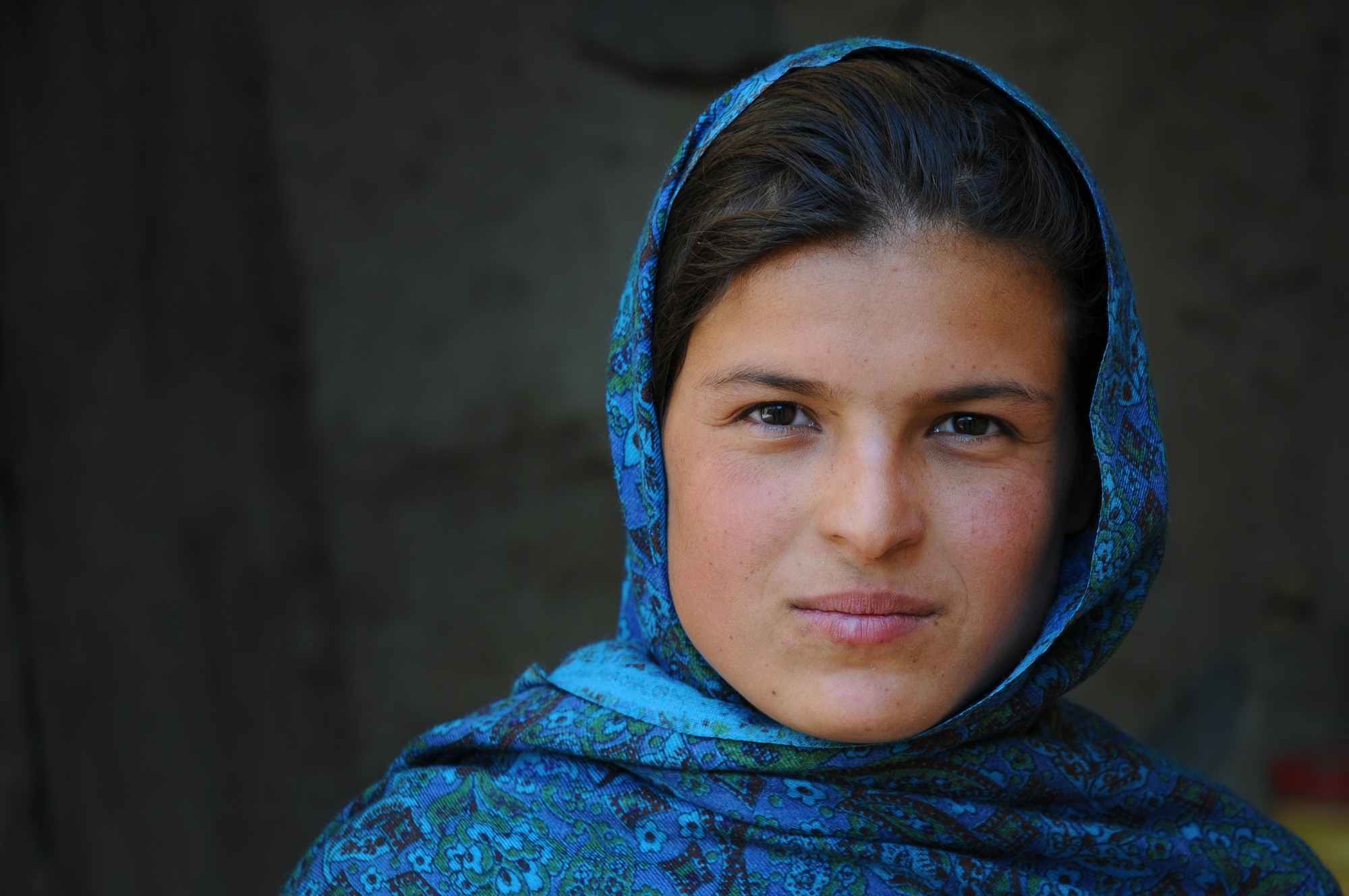 Lamia, the namesake of the Lamia Afghan Foundation, a non-profit organization found by retired Lt. Gen. John and Jan Bradley, poses for a photo during one of the Bradleys trips. They met in 2007 when Lamia pushed her way through a crowd to as a 9-year-old to ask the general for a pair of boots for her cold feet. The Bradleys have collected and delivered more than two million pounds of aid for  Afghanistan Mid-January 2010. In all, the Bradleys are working on building the seventh school and have collected and delivered more than two million pounds of supplies. (Courtesy photo)