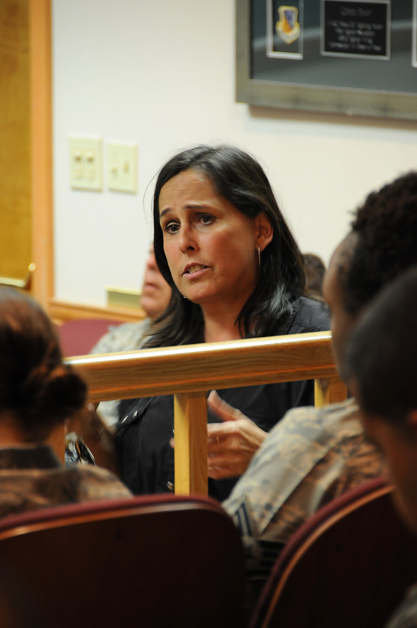 The Homestead Air Reserve Base Sexual Assault Prevention and Response Coordinator, Ms. Veronica Sforza, addresses questions during a "stand down" day, Aug. 4. Airmen across the base took time from their unit training assembly to highlight ways tor prevent sexual assault in the military and learn procedures for reporting such crimes. (U.S. Air Force photo/Tech. Sgt. Lou Burton)