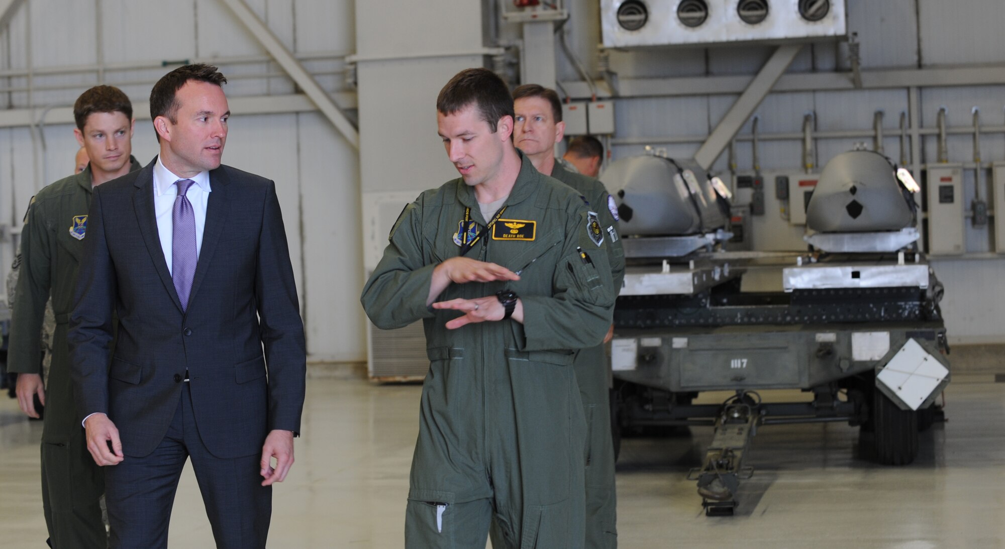 Acting Secretary of the Air Force Eric Fanning is briefed on the B-2 Spirit by U.S. Air Force Capt. Jonathon Roe, 393rd Bomb Squadron pilot, at Whiteman Air Force Base, Mo., Aug. 15, 2013. He toured a B-2 and spoke to more than 300 Airmen about Air Force issues during his visit. (U.S. Air Force photo by Staff Sgt. Alexandra M. Boutte/Released)
