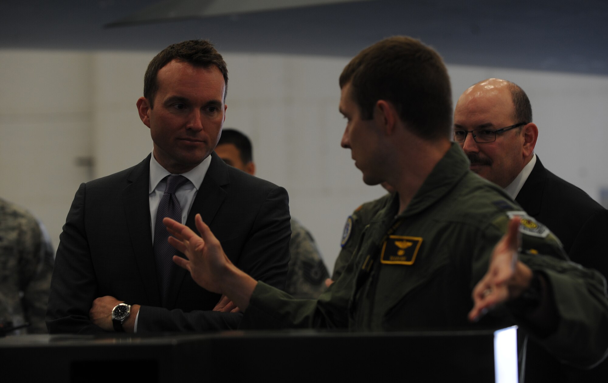 Acting Secretary of the Air Force Eric Fanning receives a briefing on the B-2 Spirit from U.S. Air Force Capt. Jonathon Roe, 393rd Bomb Squadron pilot, at Whiteman Air Force Base, Mo., Aug. 15, 2013. He toured one of the stealth bombers and spoke to more than 300 Airmen about Air Force issues. (U.S. Air Force photo by Staff Sgt. Alexandra M. Boutte/Released)