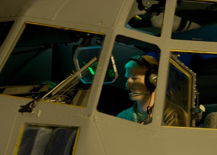 U.S. Air Force Capt. Mark Hancock, 317th Operation Support Squadron, prepares a C-130J for take-off Aug. 10, 2013, at Dyess Air Force Base, Texas. More than 2 Dyess Airmen will be integrating with units from the 37th Airlift Squadron of Ramstein Air Base, to stand in alert postures and prepare for any taskings U.S. Africa Command might have. (U.S. Air Force photo by Airman 1st Class Peter Thompson/Released)