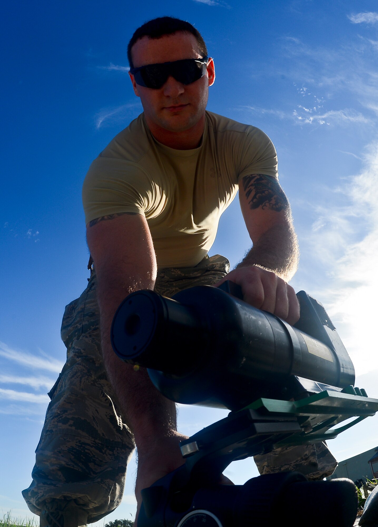 Airman 1st Class John Barr IV, an explosive ordnance disposal technician with 6th Civil Engineer Squadron, sets up an advance radiographic system (ARS) MK 41 during a training scenario Aug. 15, 2013, at MacDill Air Force Base, Fla. Barr was going through training on conventional munitions. (U.S. Air Force photo by Staff Sgt. Brandon Shapiro/Released)