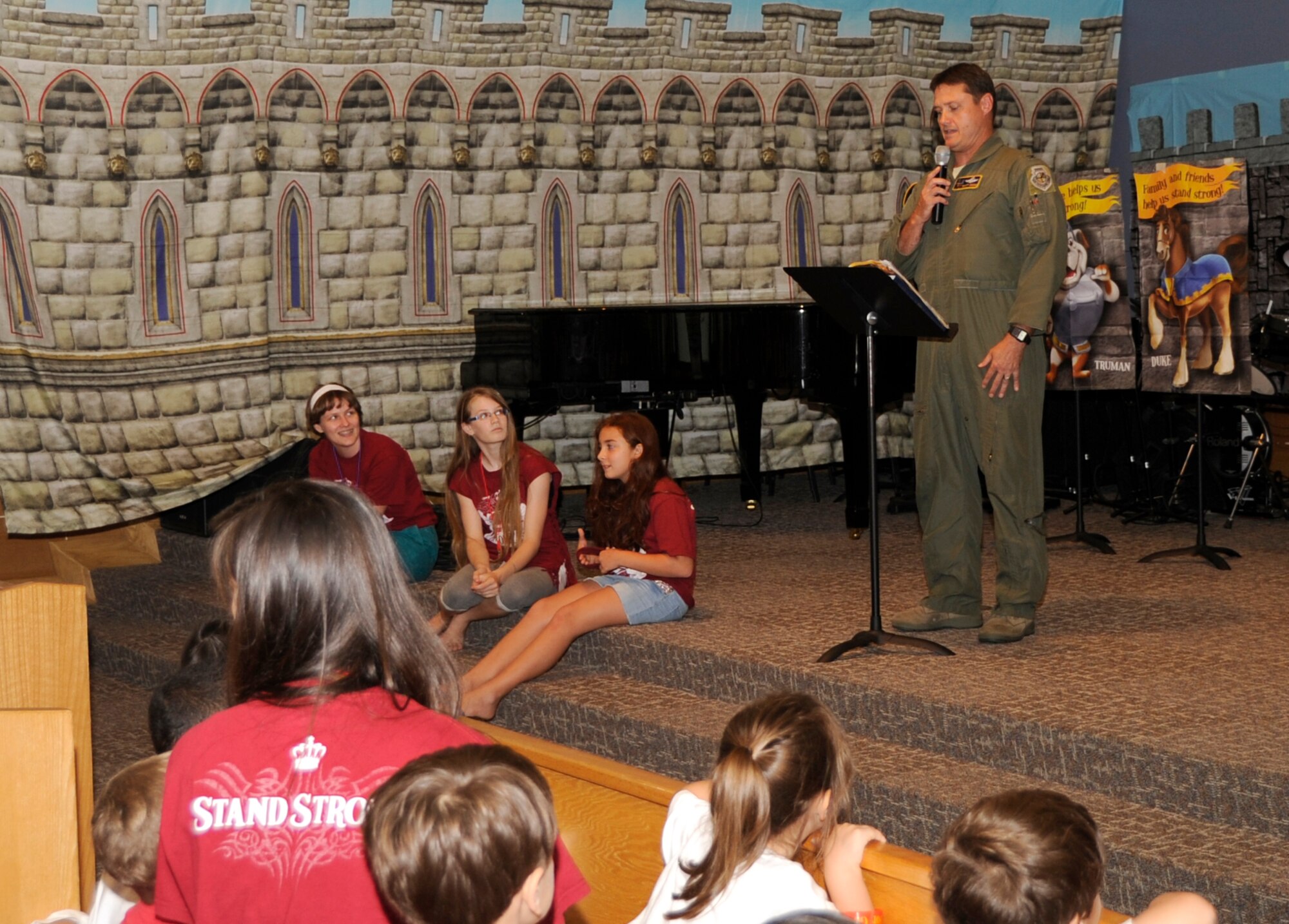 U.S. Air Force Col. Matthew Dana, 35th Fighter Wing vice commander, makes closing comments and thanks volunteers and attendees during the 35 FW Chapel Vacation Bible School at Misawa Air Base, Japan, Aug 16, 2013. The chapel’s VBS is an annual event supporting about 200 children for five days. (U.S. Air Force photo by Airman 1st Class Kaleb Snay)