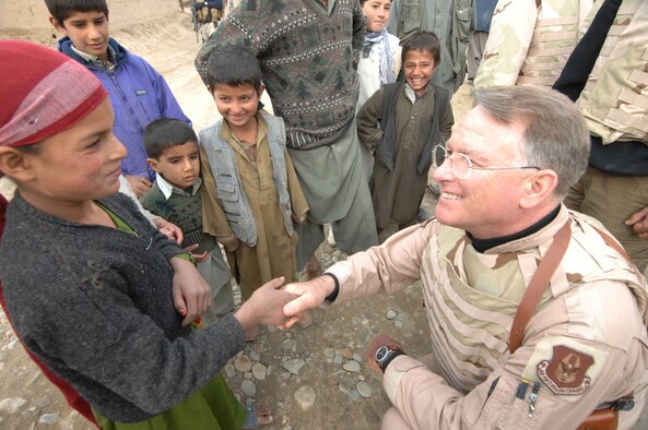 Lt. Gen. John Bradley meets Lamia for the first time in December 2007. Since that first meeting, the now retired general and his wife, Jan, started a non-profit organization in Lamia’s honor, the Lamia Afghan Foundation. The Bradleys have made seven trips to Afghanistan to build schools and deliver humanitarian supplies. (U.S. Air Force photo/Tech. Sgt. Rick Sforza)