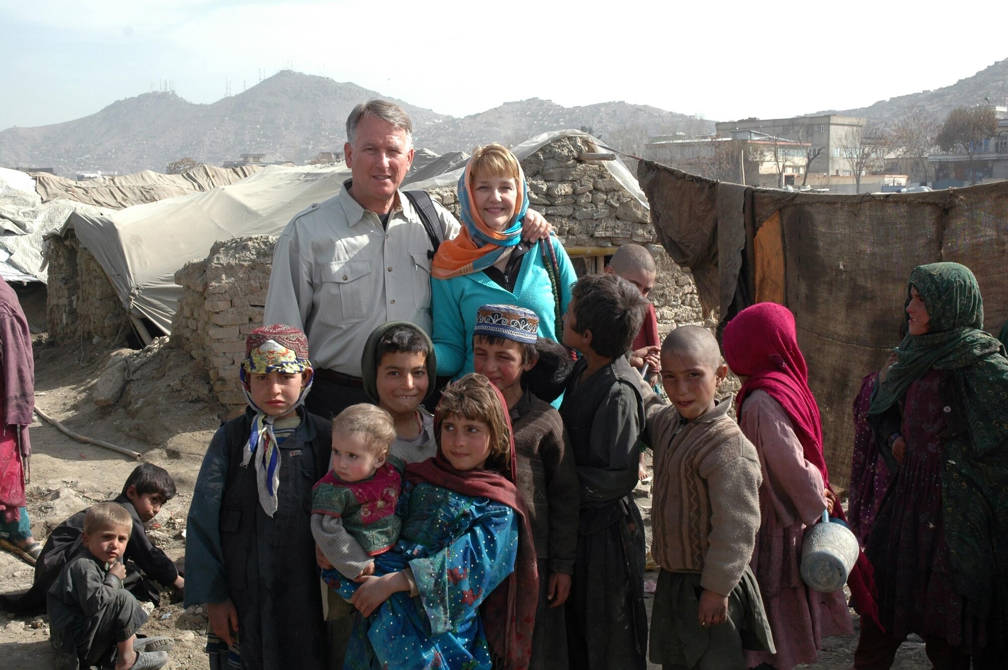 Retired Lt. Gen. John Bradley, former Air Force Reserve Command commander and chief of the Air Force Reserve, and his wife, Jan Bradley, visit Afghanistan, where they've begun building three schools for Afghan children. They also created the Lamia Foundation, named after a little girl Bradley met in 2007, which provides clothing and food to Afghan children in need. (Courtesy photo)