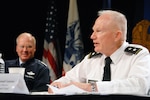 Army Maj. Gen. Raymond Carpenter, the acting director of the Army National Guard, right, and Air Force Gen. Craig R. McKinley, the chief of the National Guard Bureau, along with other Guard leaders answered questions from the audience during a panel discussion at the 2010 National Guard Volunteer Workshop in New Orleans Aug. 2, 2010. Over 1,000 Guard volunteers from the 54 states and territories are at the conference.