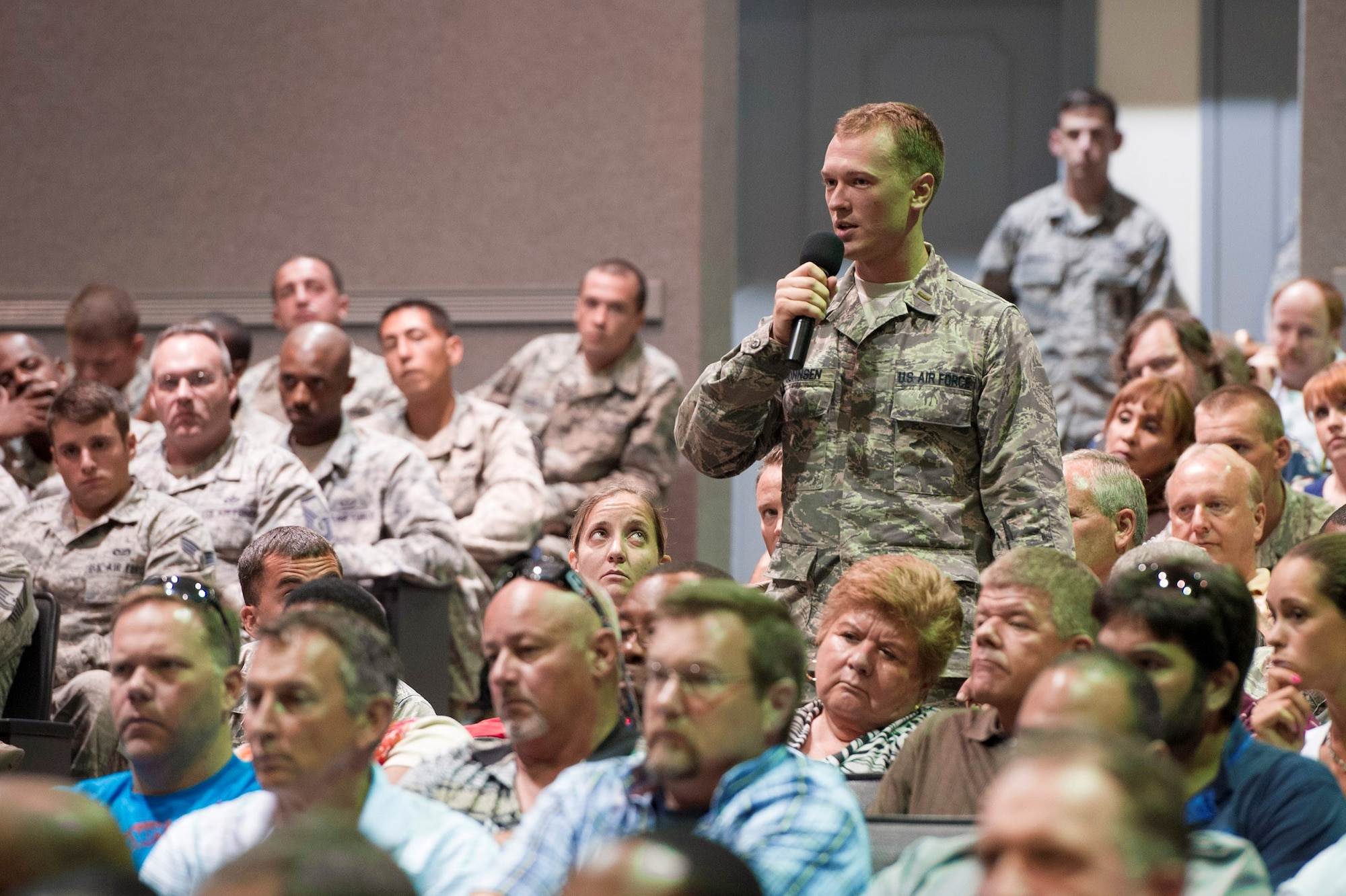 During the 45th Space Wing All-Call, 2nd Lt. Giles Gonnsen asks Acting Secretary of the Air Force Eric Fanning a question on decisions being made by the country's top leaders Aug 8, 2013, at Patrick Air Force Base, Fla. Gonnsen is assigned to the 45th Logistics Readiness Squadron. 