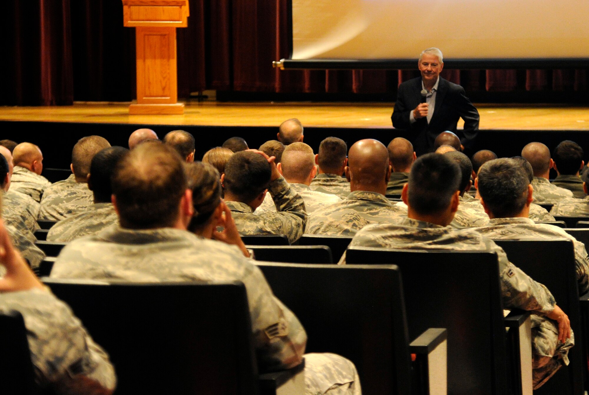 Retired Chief Master Sgt. Robert Gaylor, Fifth Chief Master Sergeant of the Air Force, speaks to members of Team Fairchild during an enlisted call at Fairchild Air Force Base, Wash., Aug. 16, 2013. During the enlisted call, Chief spoke on what he calls “the four T’s.” They stand for Training, Technology, Tribe and Trust. (U.S. Air Force photo by Airman 1st Class Ryan Zeski/Released)