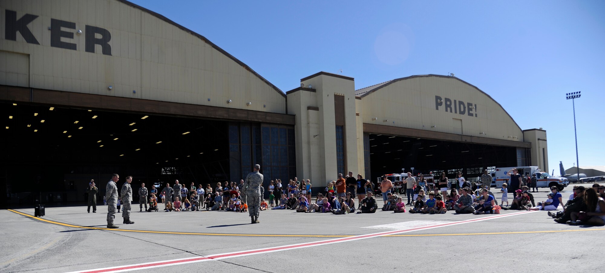 Col. Brian Newberry, 92nd Air Refueling Wing commander, speaks to families of Team Fairchild during Family Recognition Day at Fairchild Air Force Base, Wash., Aug. 19, 2013. The event was made possible by the hard work of Fairchild’s Airmen and multiple base agencies. (U.S. Air Force photo by Airman 1st Class Ryan Zeski/Released)