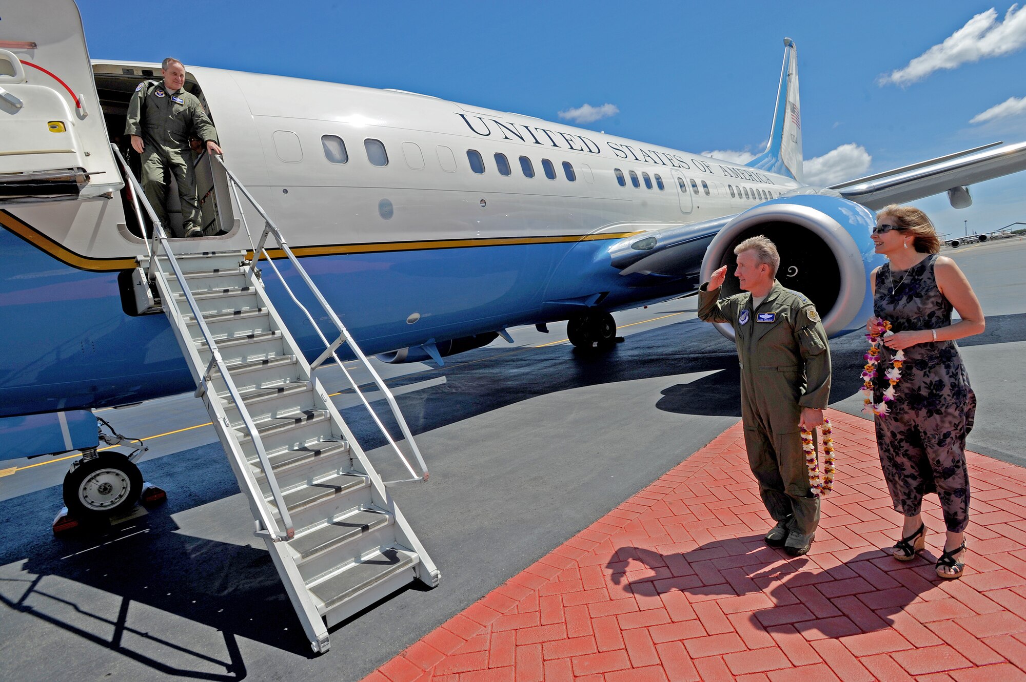 Gen. Hawk Carlisle, U.S. Pacific Air Forces commander, and his wife Gillian, welcome Air Force Chief of Staff Gen. Mark A. Welsh III as he arrives at Joint Base Pearl Harbor-Hickam, Hawaii, Aug. 18, 2013. Welsh, along with Chief Master Sergeant of the Air Force  James Cody, visited as a part of a multi-base tour to meet with Airmen throughout the Pacific area of responsibility. (U.S. Air Force photo/Tech. Sgt. Jerome S. Tayborn)