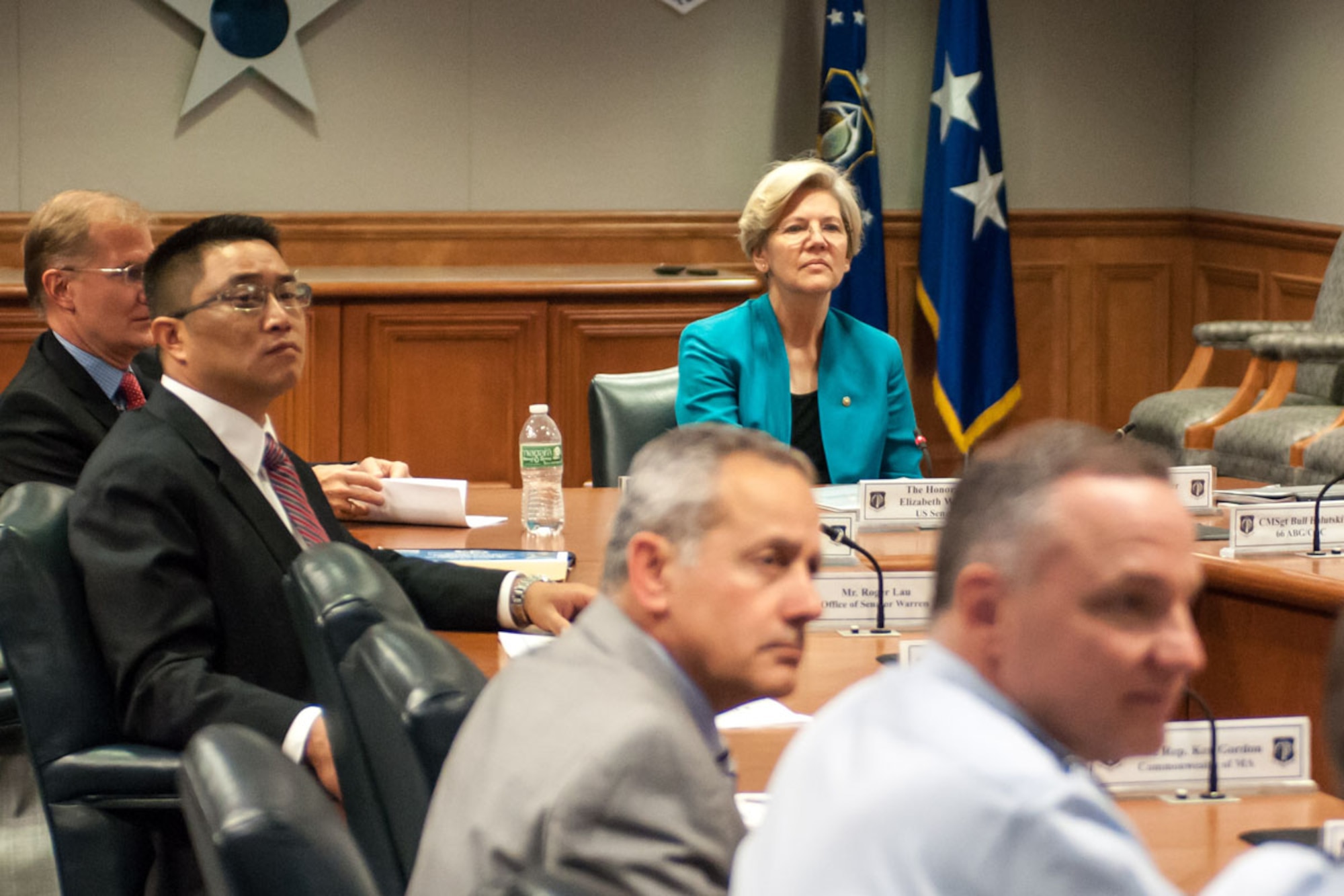 HANSCOM AIR FORCE BASE, Mass. -- U.S. Senator Elizabeth Warren, her State Director Roger Lau and Hanscom senior leaders, listen to an Air Force Life Cycle Management Center mission overview during her first full visit here Aug. 20. The senator also participated in technology demonstrations, a windshield tour of the base, and visited the Mass. National Guard Joint Force Headquarters. (U.S. Air Force photo by Rick Berry)