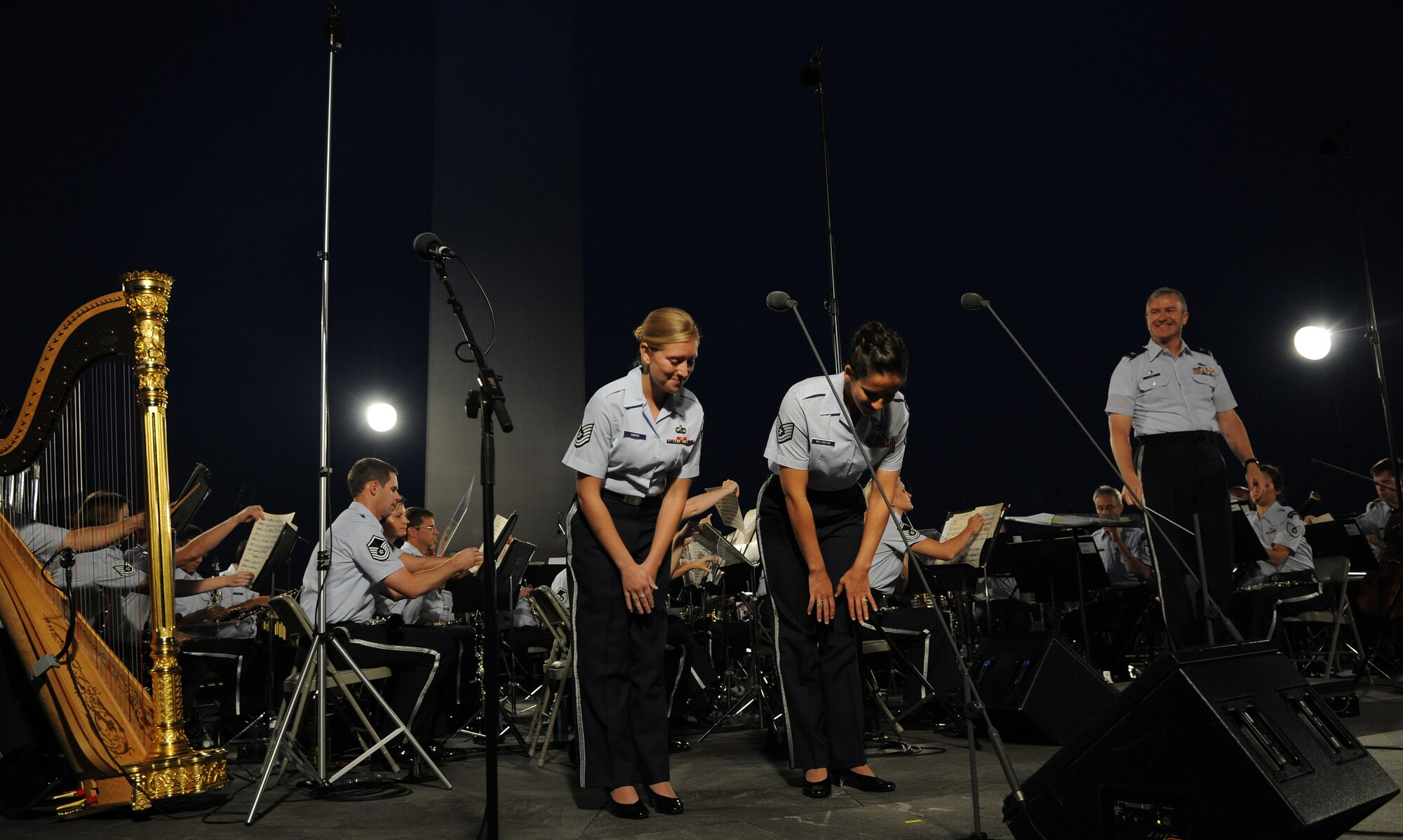 Tech. Sergeants Mandi Harper and Emily Wellington take bow after performing Delibes’s “Flower Duet” during the United States Air Force Band’s concert in Washington, D.C., August 16, 2013. More than 100 people attended the free concert held at The Air Force Memorial. (U.S. Air Force photo/Airman 1st Class Nesha Humes)(Released)