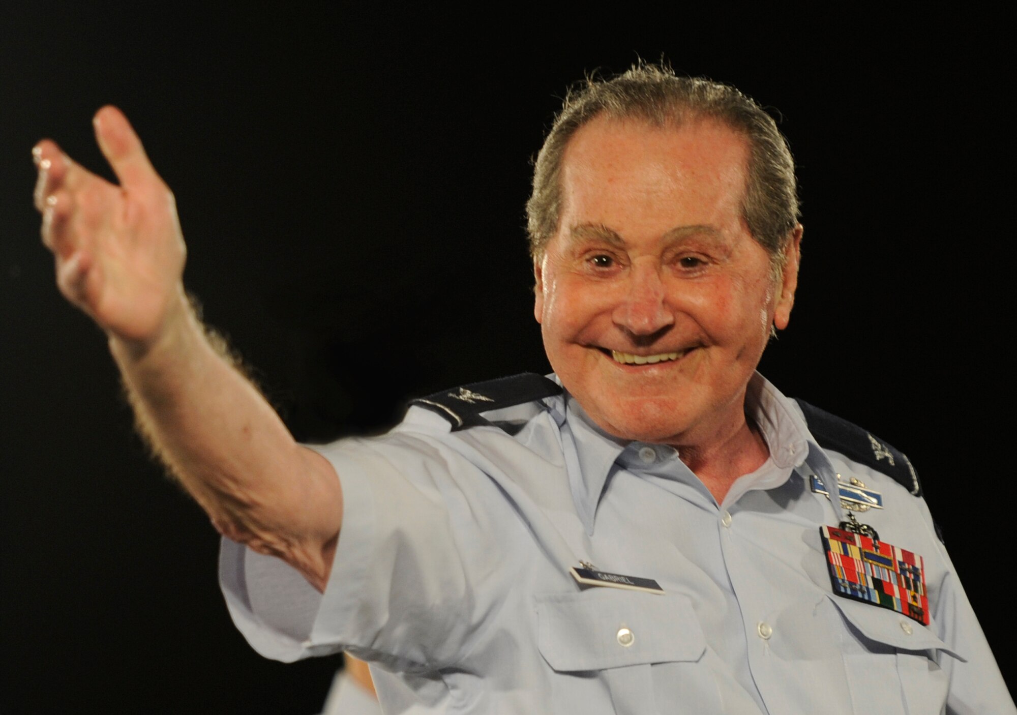 Retired Col. Arnold D. Gabriel, United States Air Force Band Conductor Emeritus, concludes the performance of Giroux’s “The Italian Rhapsody,” during a concert at The Air Force Memorial in Washington, D.C., August 16, 2013.  Gabriel was a combat machine gunner with the United States Army’s 29th Infantry Division in Europe during World War II, and was awarded two Bronze Star medals, the Combat Infantryman’s Badge and the French Croix de Guerre. (U.S. Air Force photo/Airman 1st Class Nesha Humes)(Released)